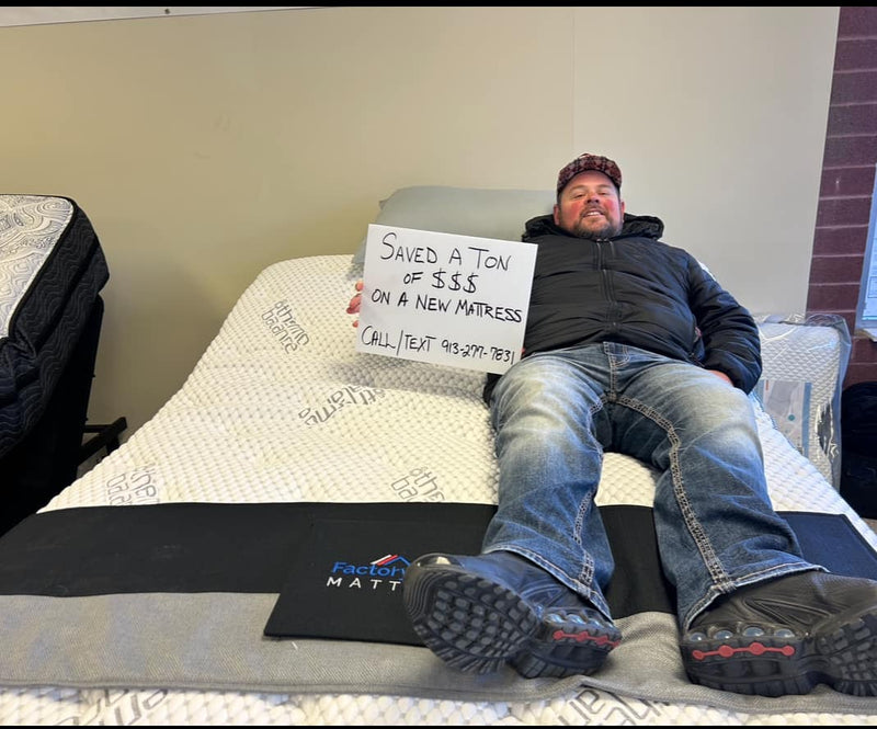 Happy customer saving a ton of money on his new mattress at Factory Direct Mattress KCK