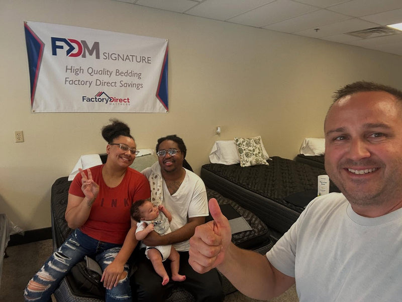 Happy family purchasing a California King Everest Bed in Box mattress