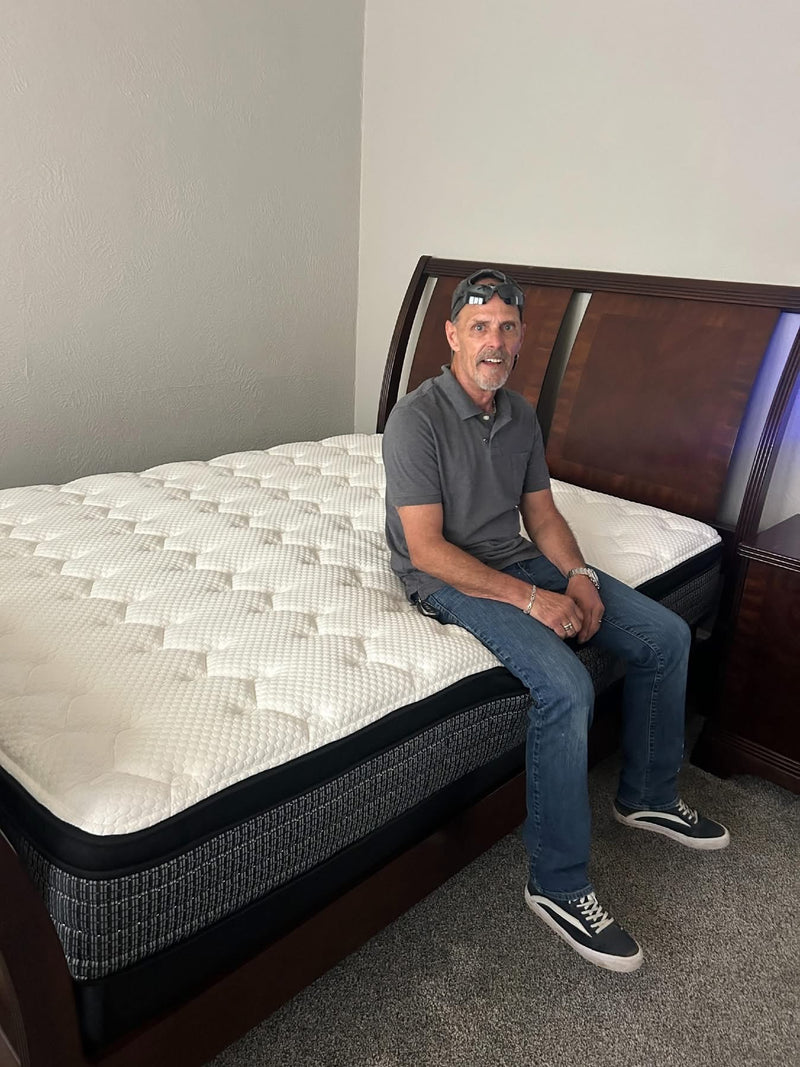 Happy customer with mattress delivered to their home