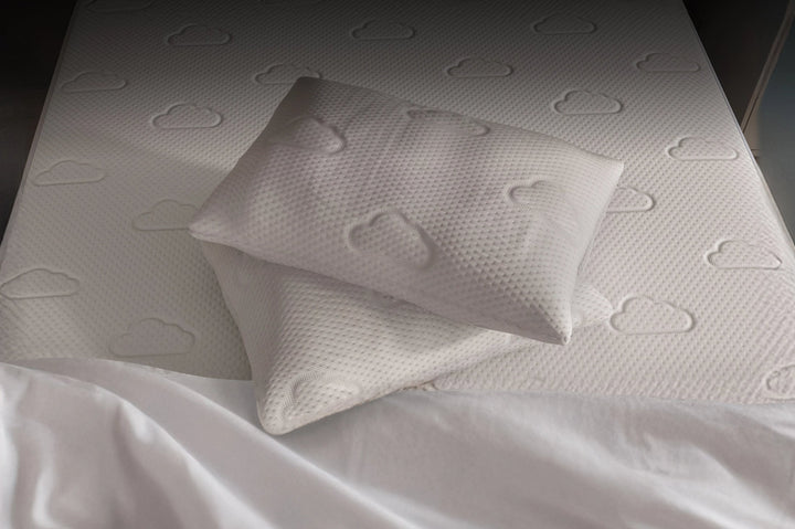 Puffy Cloudlike Pillow on bed