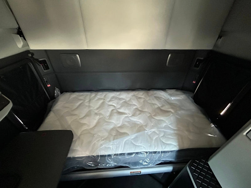 Semi truck with a Twin XL mattress upgrade from Factory Direct Mattress KCK