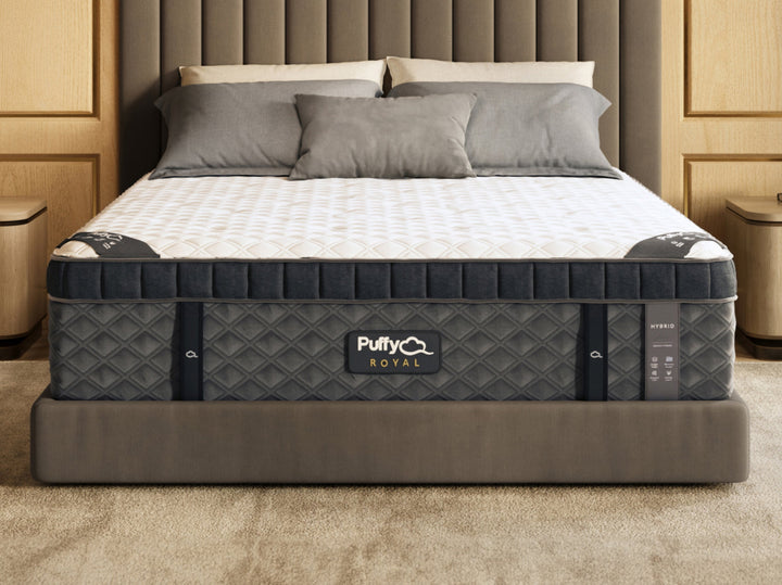 A hybrid mattress by Puffy Royal displayed in a bedroom setting, showcasing the mattress from Factory Direct Mattress KCK